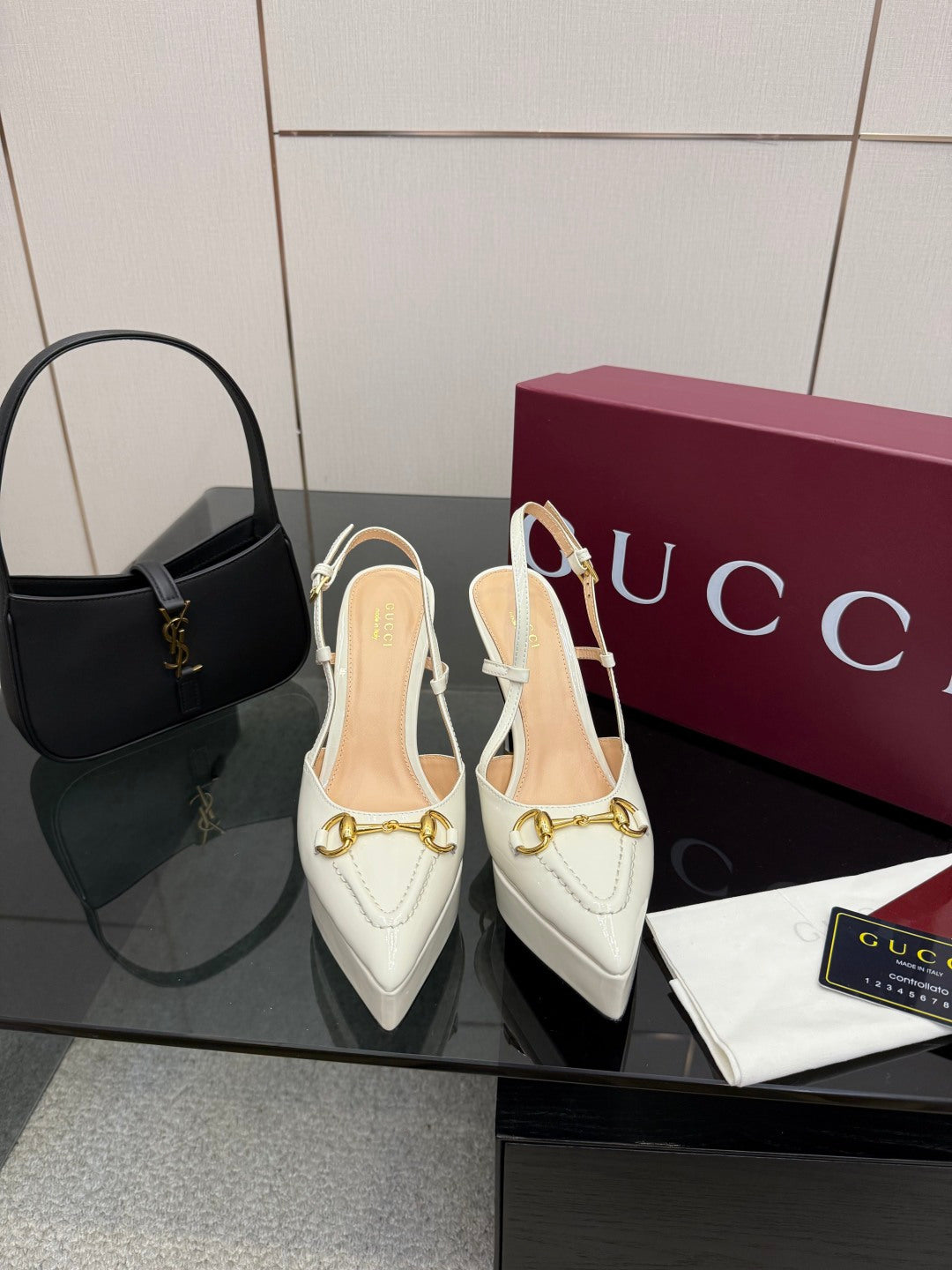 White Gucci slingback high heels with gold buckle detail