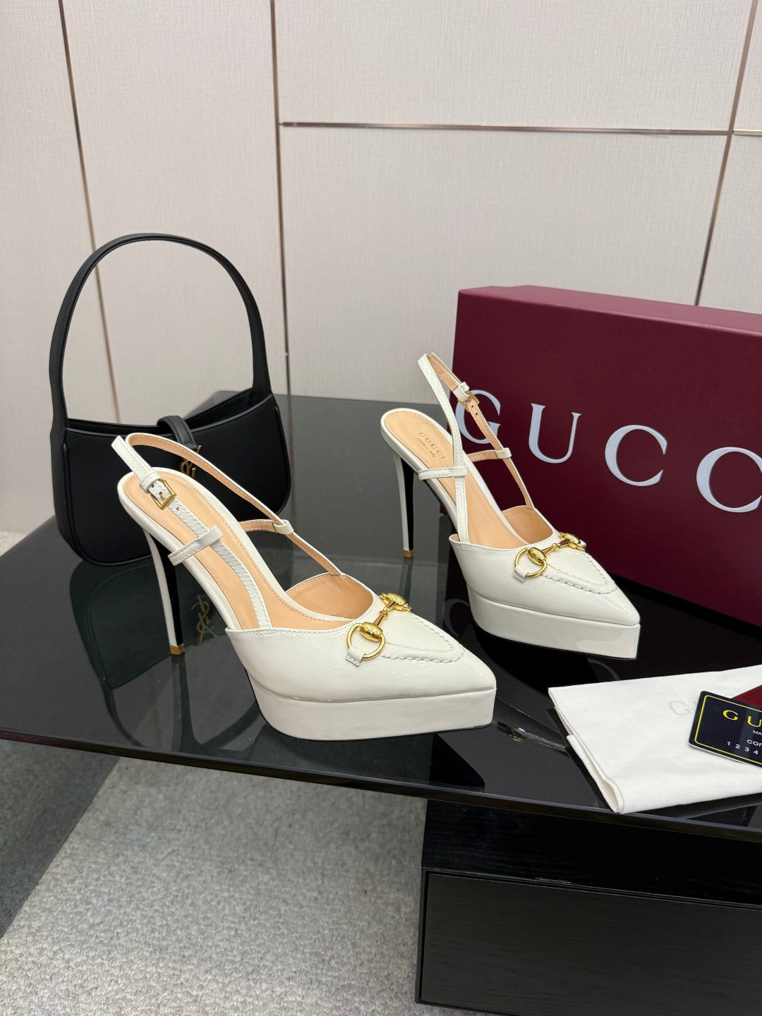 White Gucci slingback platform heels with gold strap detail