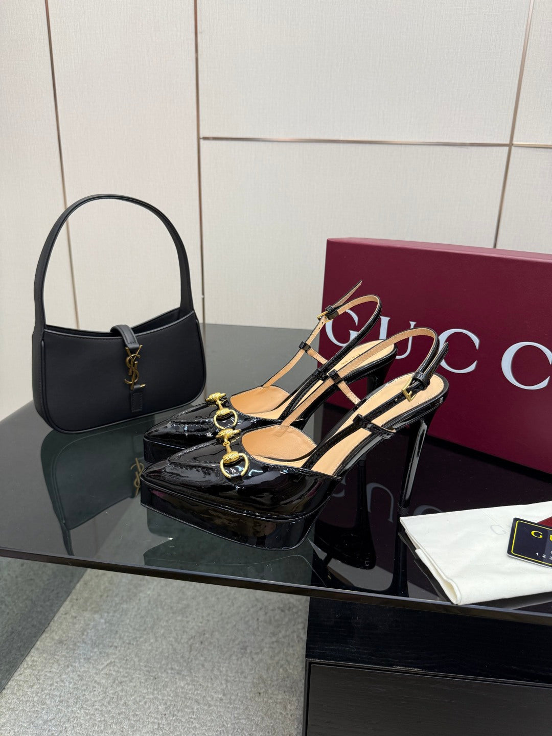 Gucci ladies black slingback heels with gold buckle chain strap detail