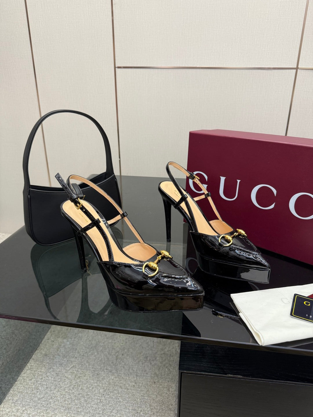 Gucci ladies black patent slingback heels with gold chain strap and stiletto