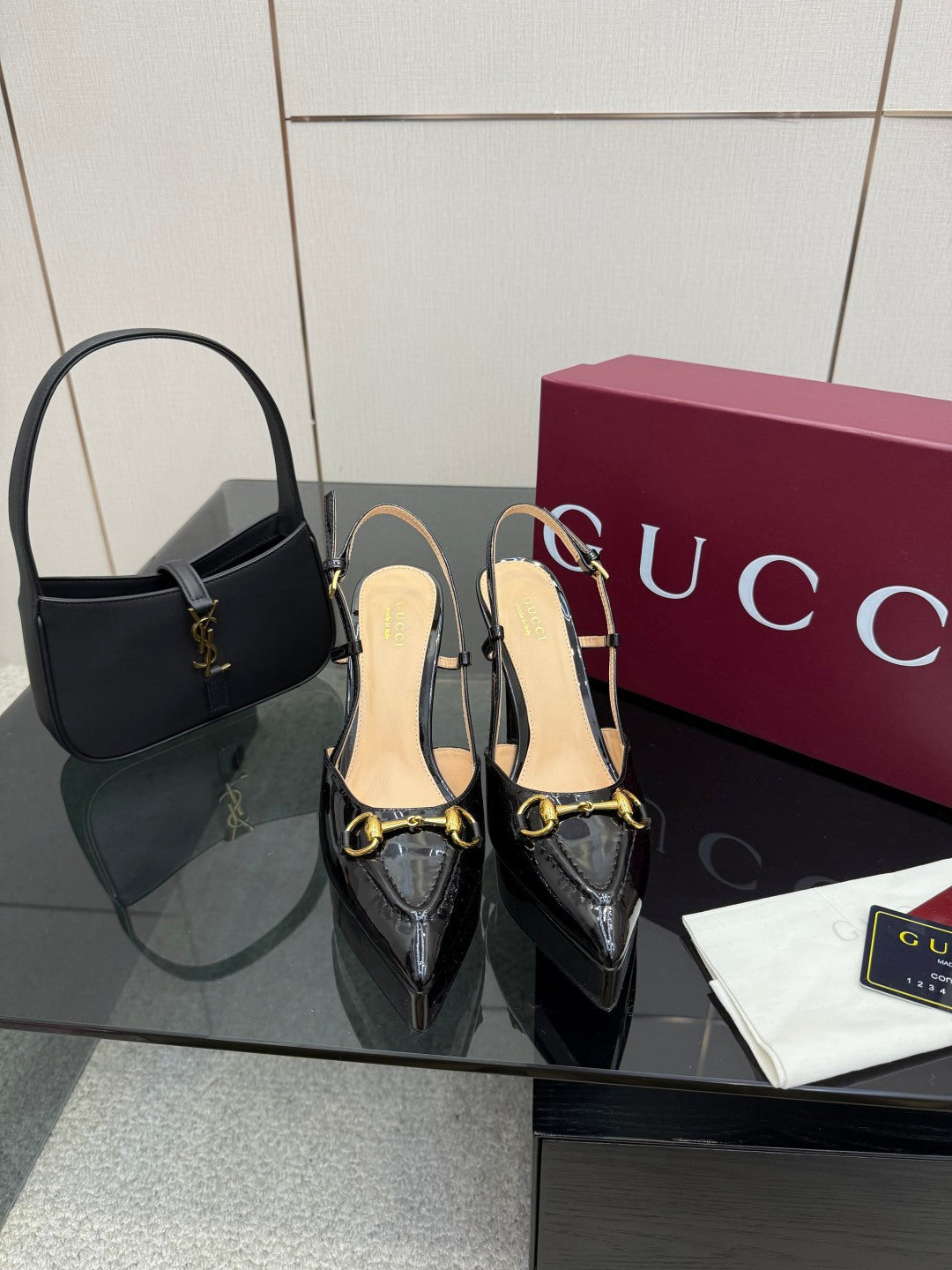 Gucci ladies black slingback heels, gold chain buckle detail, stiletto heel