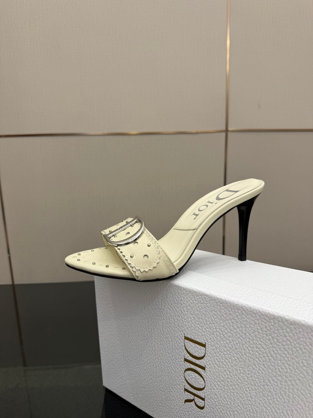 Dior ladies cream mule with buckle strap and high stiletto heel