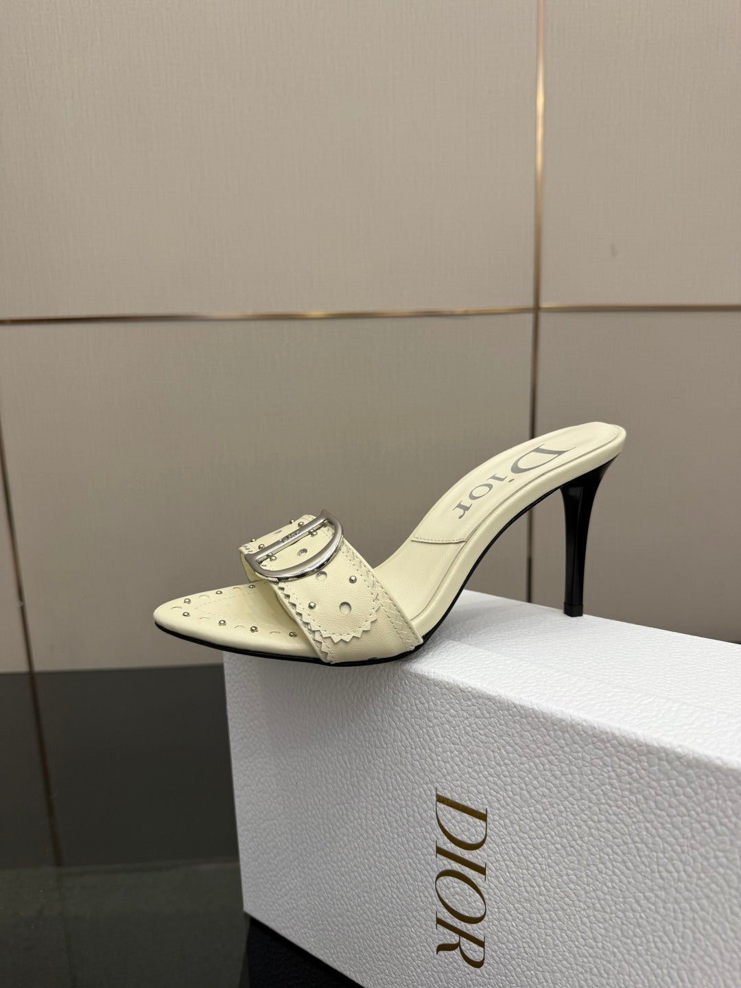 Dior ladies cream mule with buckle strap and high stiletto heel