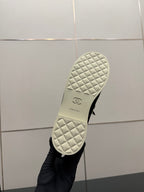 Chanel women’s sneaker outsole, white quilted tread with Chanel logo