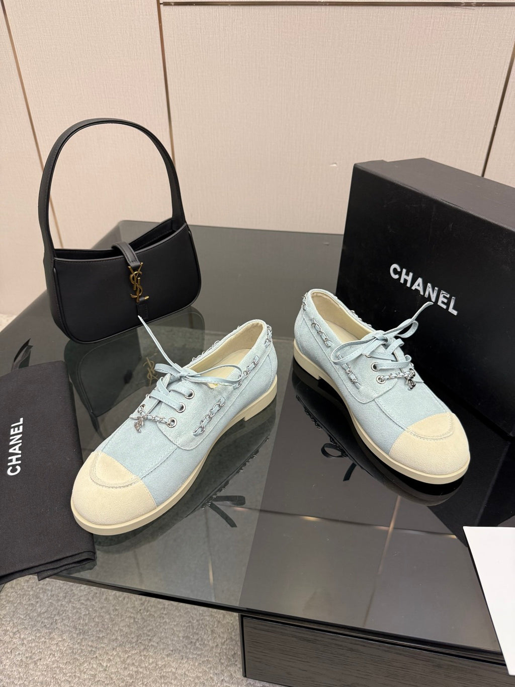 Chanel women's light-blue sneakers with white rubber sole and lace-up closure