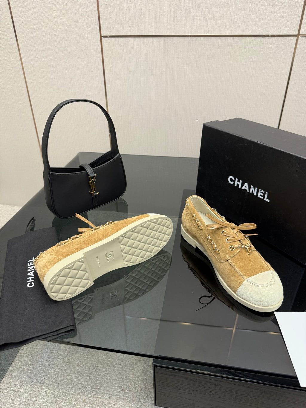 Ladies tan suede sneakers with quilted white outsole detail and lace front