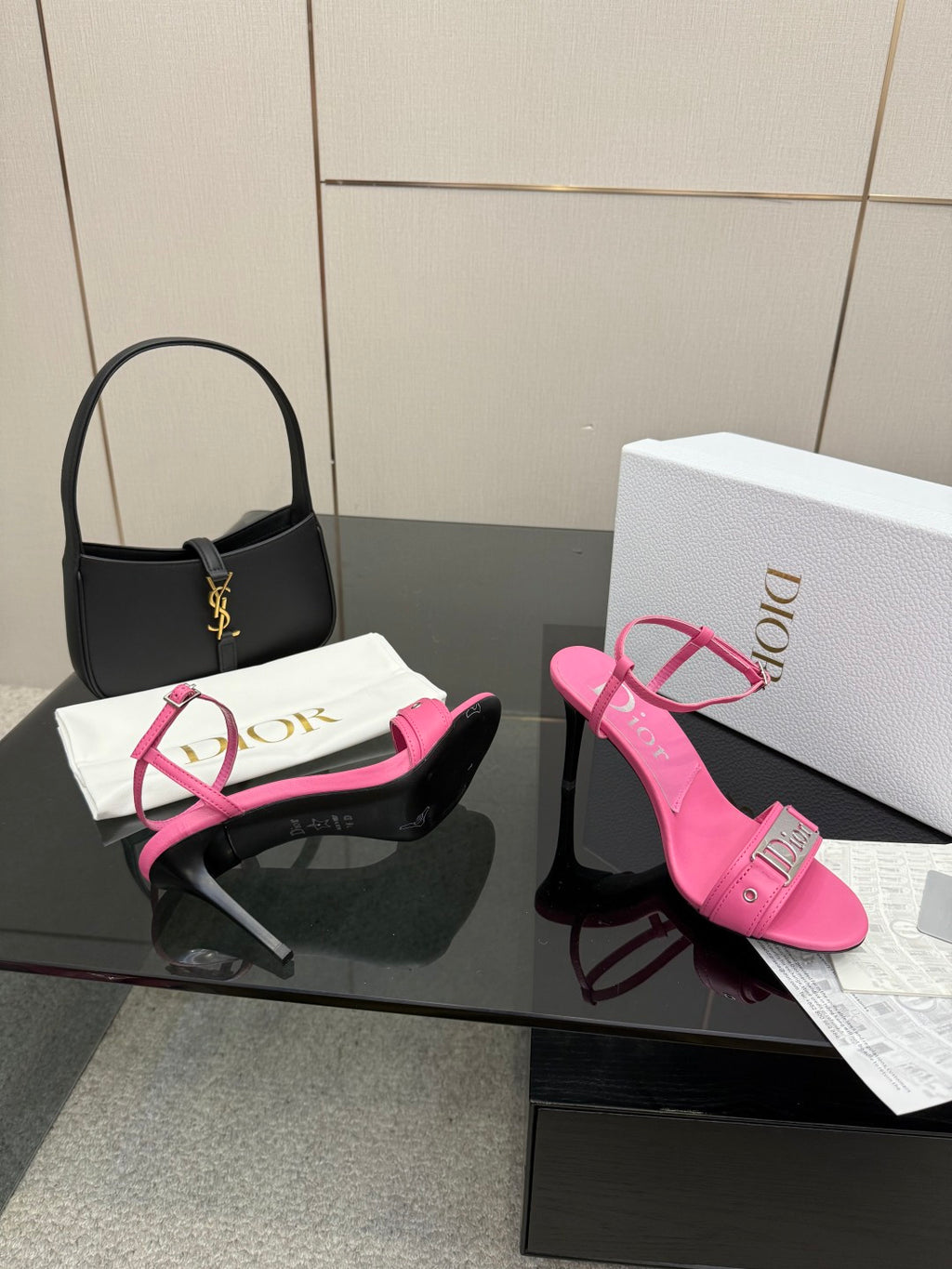 Pink Dior ladies heeled sandals with ankle strap, one shoe front and one side view.