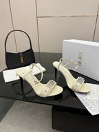 Cream slingback sandals with ankle strap and thin heel, open-toe design