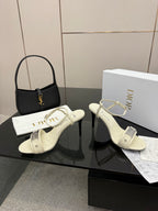 Cream slingback sandals with ankle strap and thin heel, white leather upper