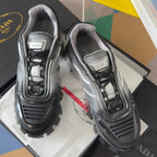 Prada unisex chunky sneakers, silver and black with lace-up uppers, close front