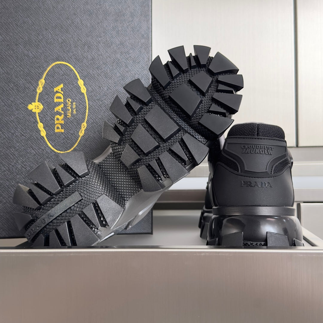 Prada chunky sneaker sole, black outsole with raised tread blocks and heel logo