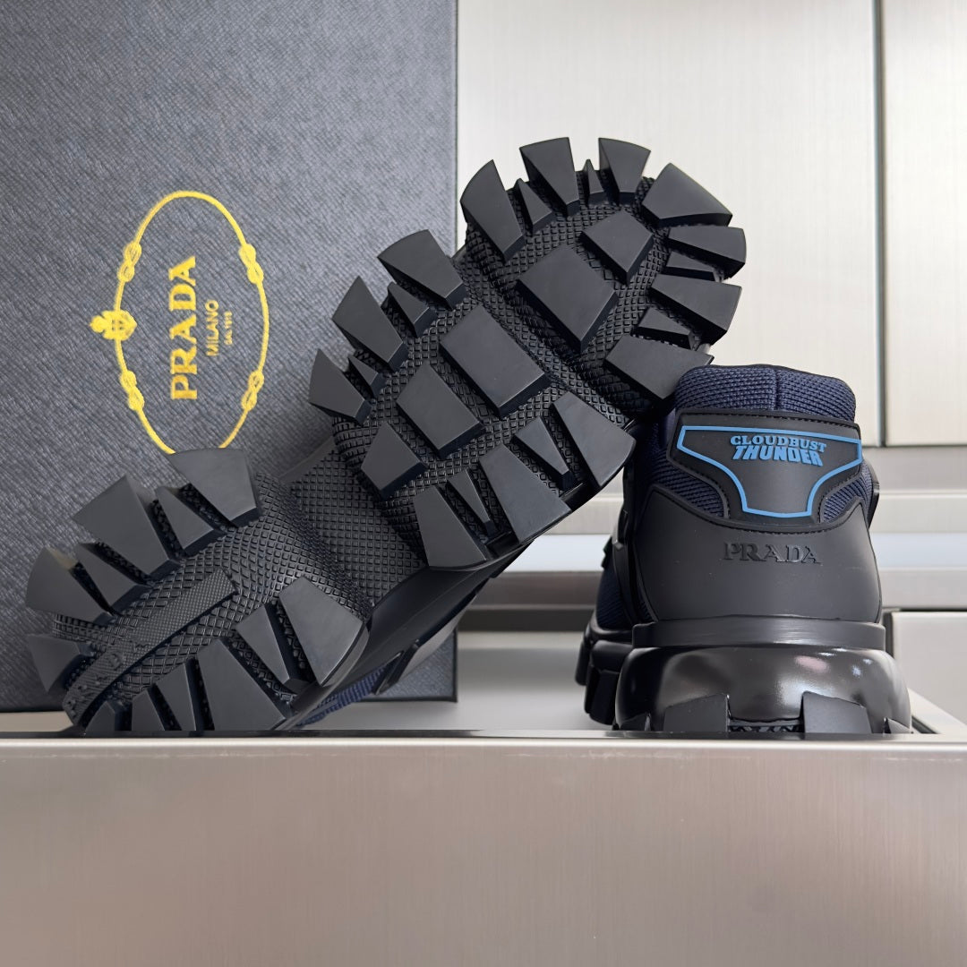 Unisex sneakers showing dark blue heel and black spiked tread outsole.