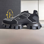 Prada unisex chunky sneakers in black with white stripe trim and rugged lug outsole