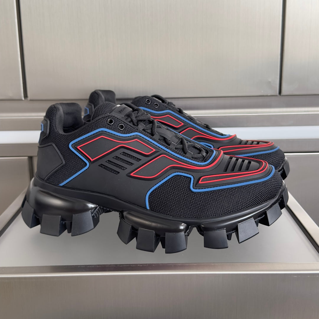 Prada unisex sneakers with dark mesh upper, blue and red trim, chunky lug sole
