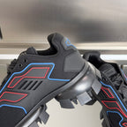 Prada unisex sneaker close-up of blue/red trim, textured upper, and molded lug outsole