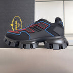 Prada unisex sneaker side view with blue and red edge accents and rugged tread sole