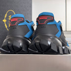 Blue and black unisex Prada sneakers with rear heel logo and thick lug outsole
