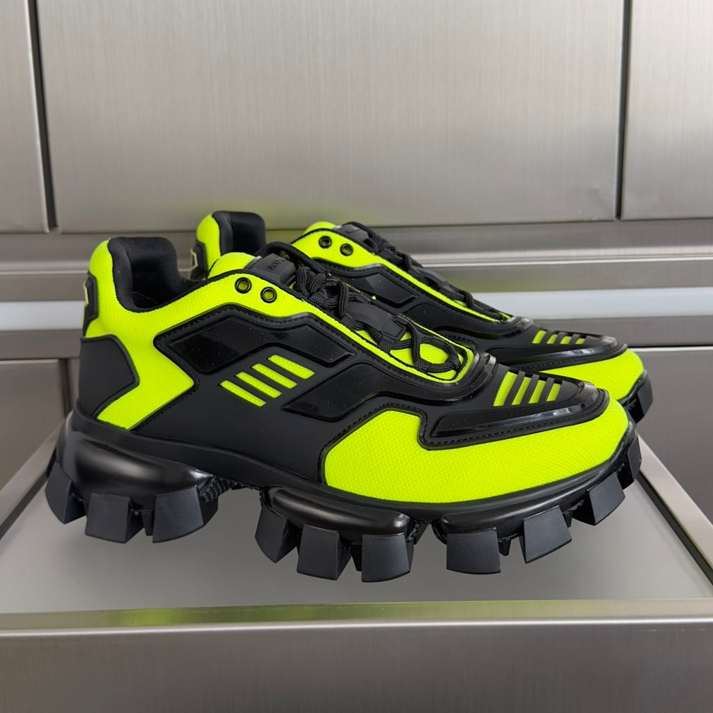 Neon green and black Prada chunky lace-up shoes with thick studded outsole
