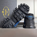 Prada sneakers with blue heel label, chunky tread outsole, and dark platform sole