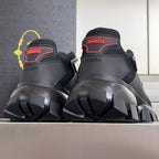Prada unisex sneakers heel view with padded back and bold lug sole, lace-up