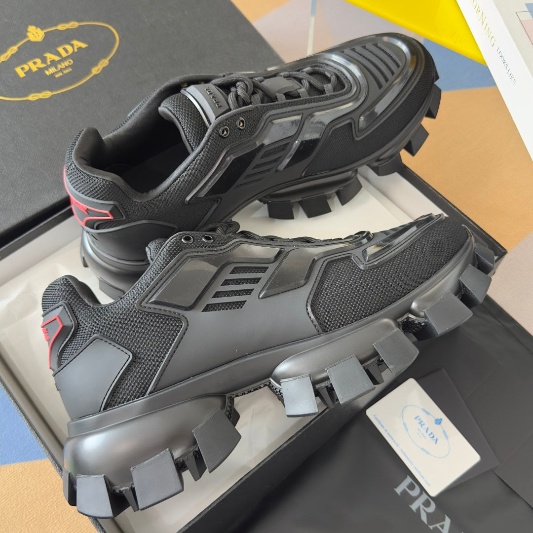 Black Prada unisex sneakers with side straps and molded tread lug sole