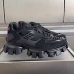 Black Prada unisex sneakers with chunky rubber lug sole and mesh uppers