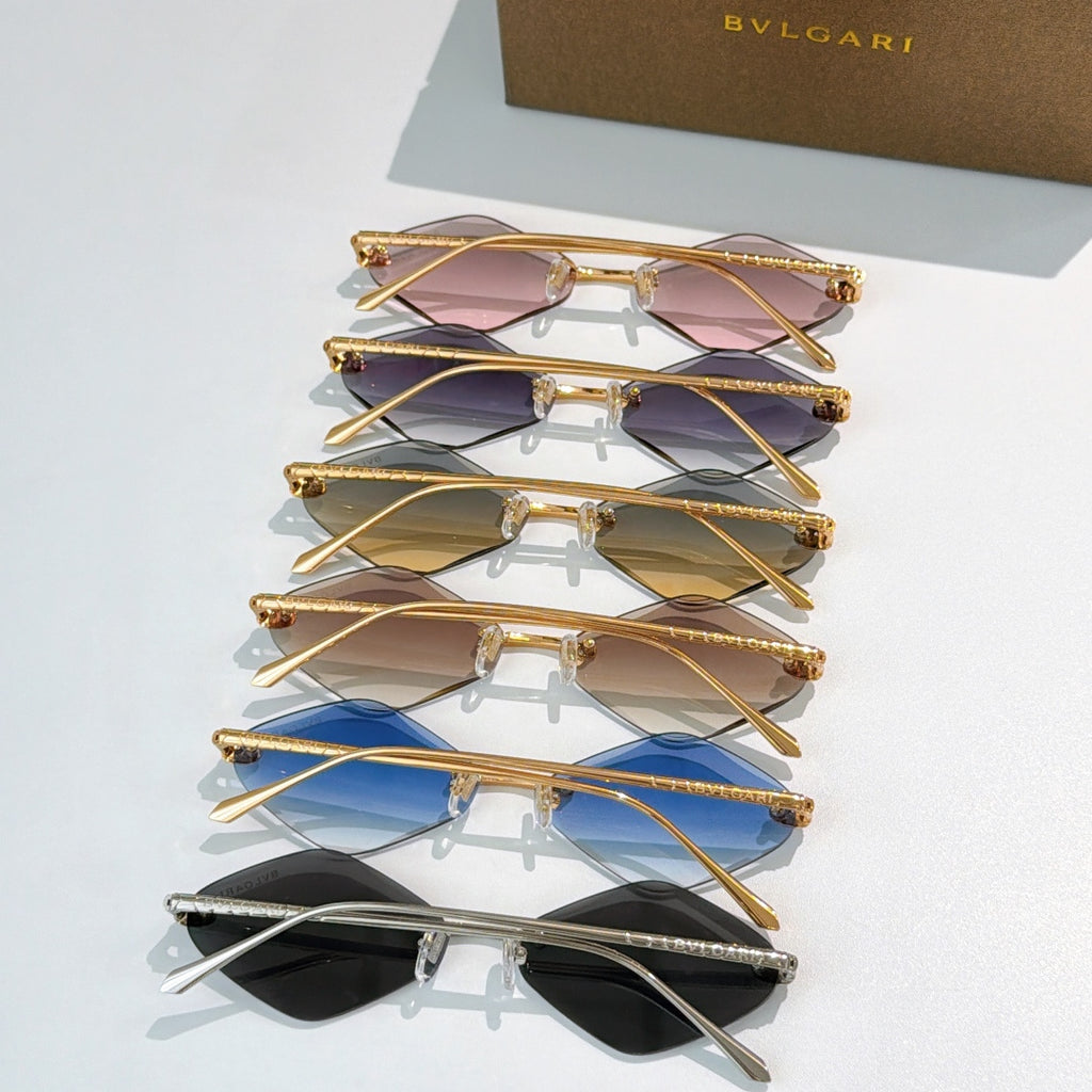 Set of Bvlgari sunglasses with gold-tone frames and assorted tinted lenses