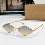 Bvlgari gold-tone sunglasses with amber lenses and angular frames