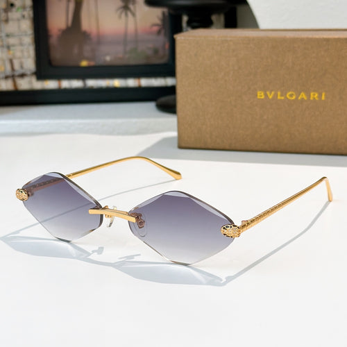 Bvlgari gold-tone sunglasses with blue-violet lenses and angular frames