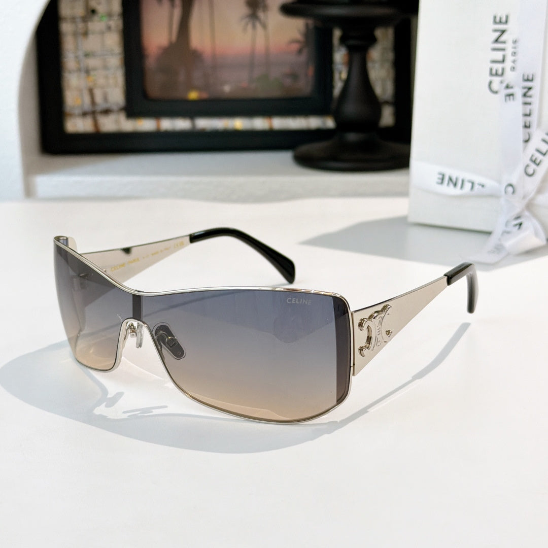 Celine sunglasses with gold frame, gradient brown tinted lenses and dark arms