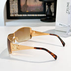 Celine sunglasses with gold frame and warm amber tinted lenses, tortoiseshell temples