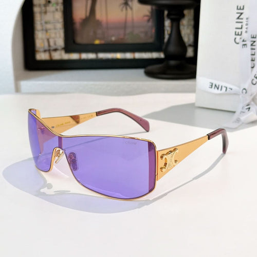 Celine sunglasses with gold frame and purple tinted lenses, cat-eye shield shape