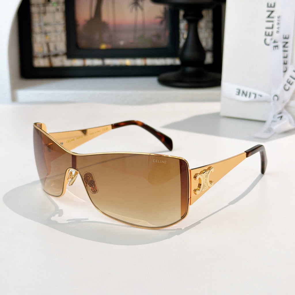 Celine sunglasses with gold frame and amber gradient tinted lenses, tortoiseshell arms