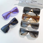 Set of Celine sunglasses with different tinted lenses and gold frames, cat-eye shield shapes