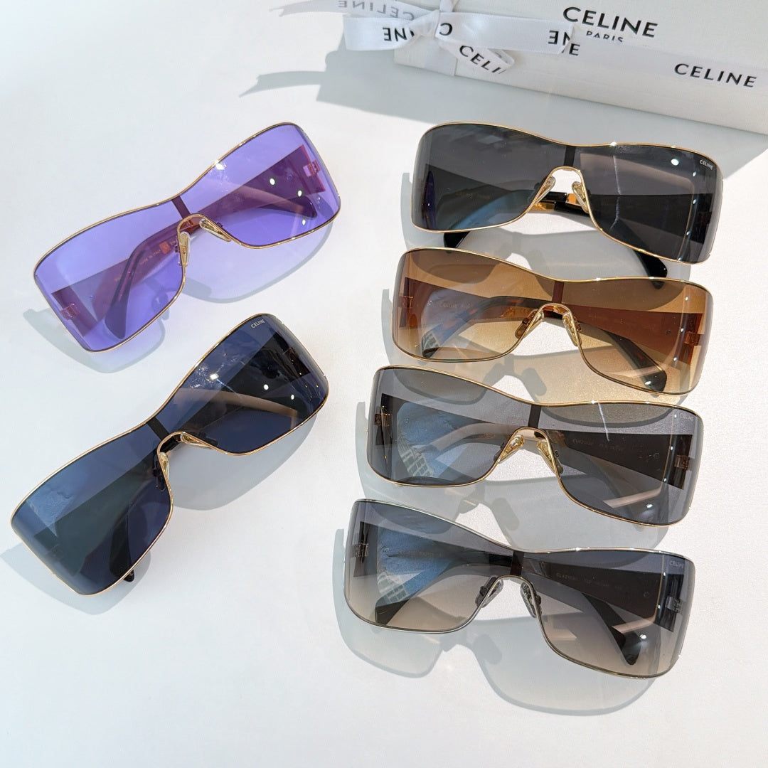 Set of Celine sunglasses with different tinted lenses and gold frames, cat-eye shield shapes