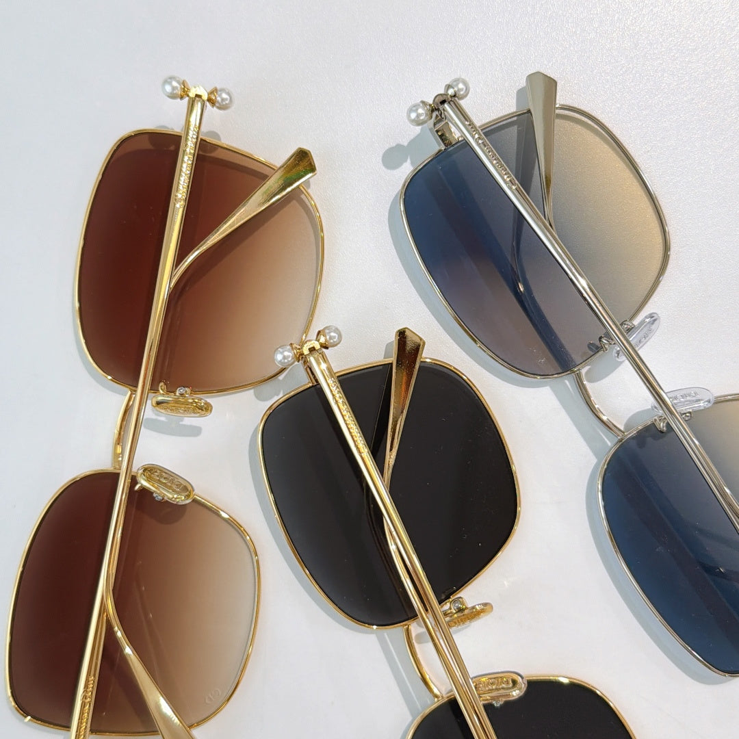 Dior sunglasses assortment with gold and silver frames, various tinted lenses overlapping