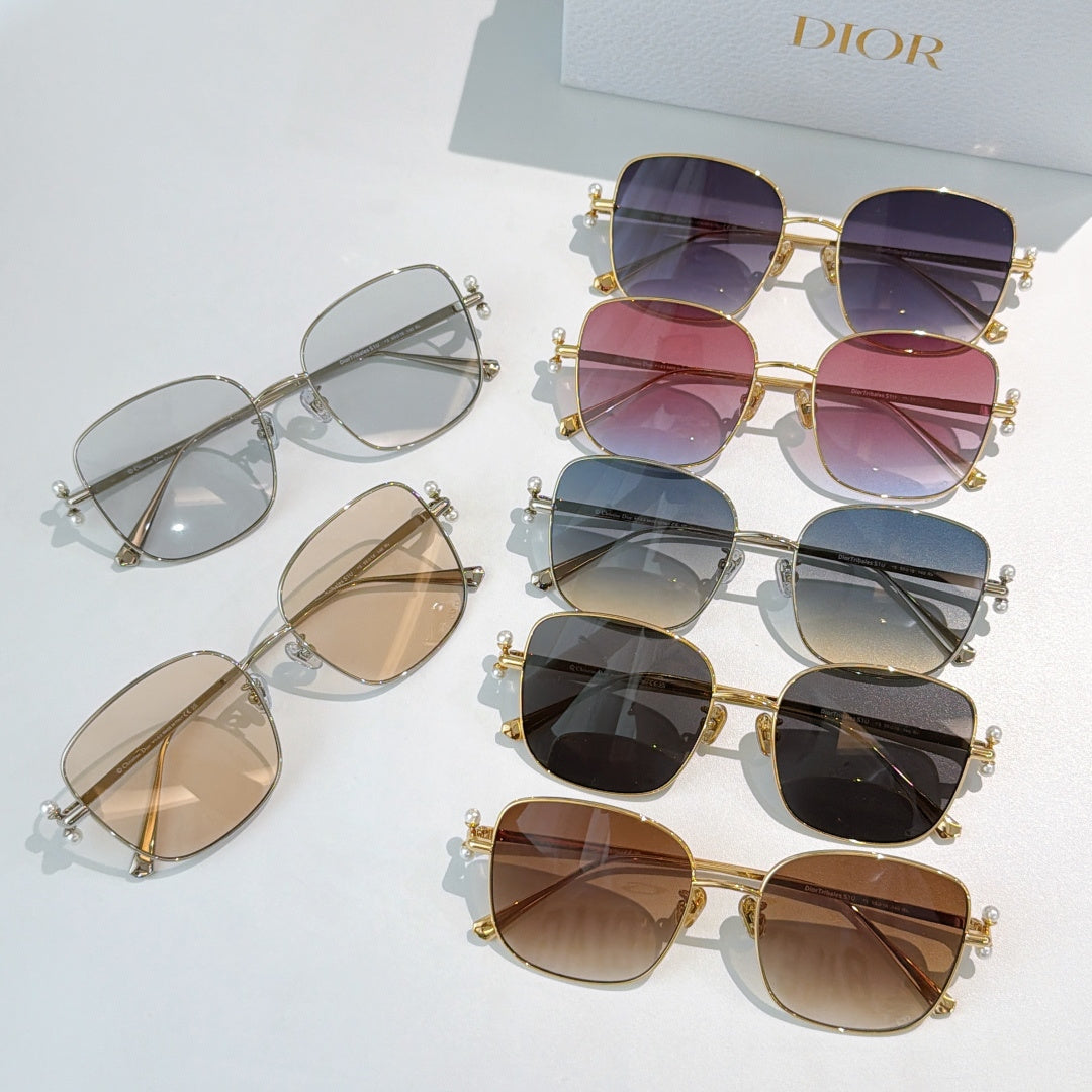 Dior sunglasses set with mixed frames and tinted lenses, multiple pairs laid out