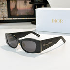 Dior cat-eye sunglasses with black frames and dark charcoal lenses