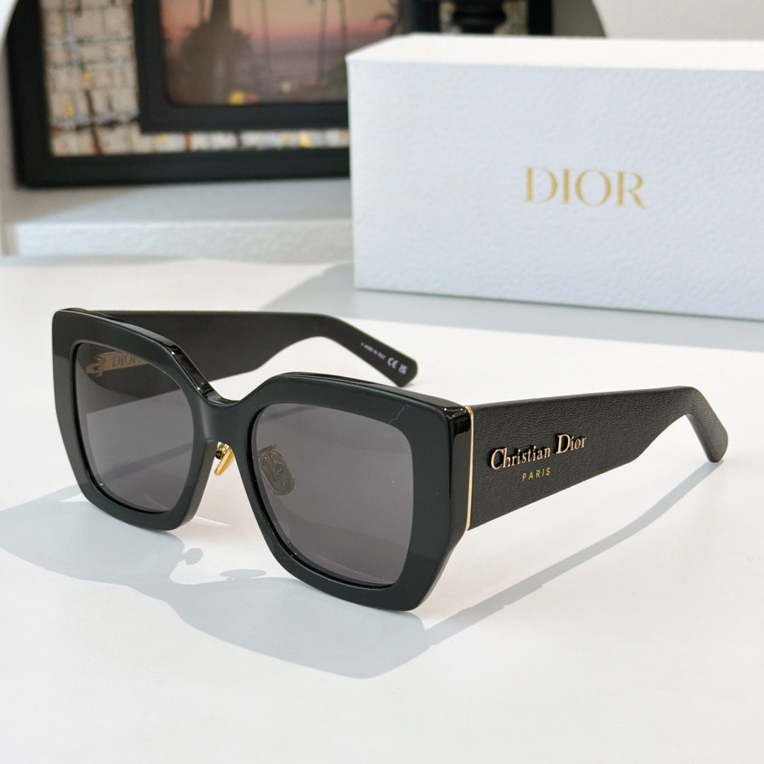 Dior sunglasses with black oversized square frames and dark gradient lenses