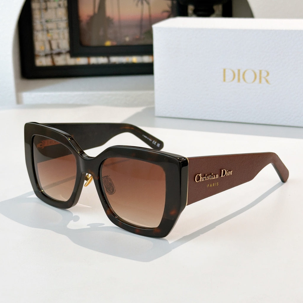 Dior sunglasses with dark brown oversized frames and brown gradient lenses