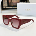 Dior sunglasses with red oversized frames and pink gradient lenses