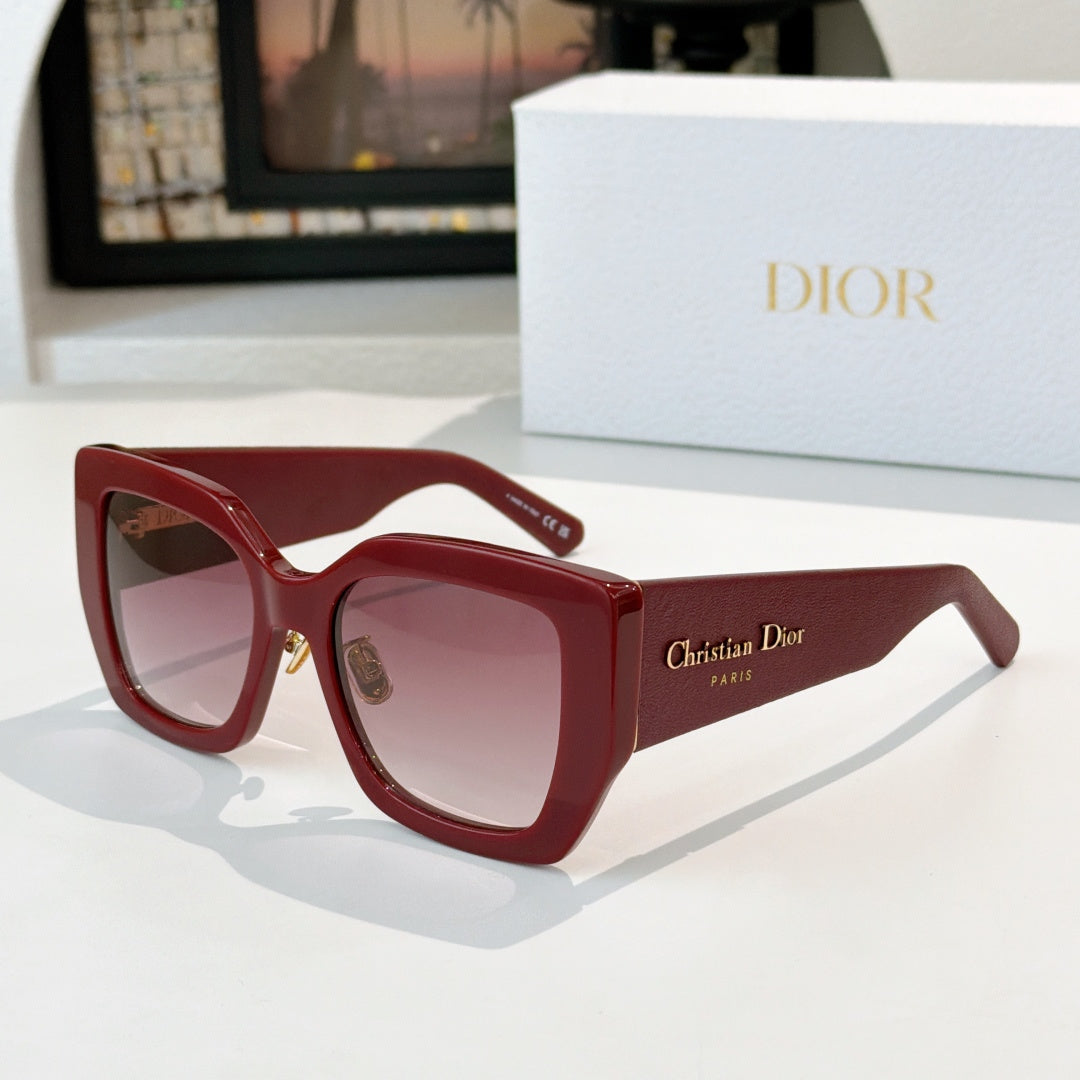 Dior sunglasses with red oversized frames and pink gradient lenses