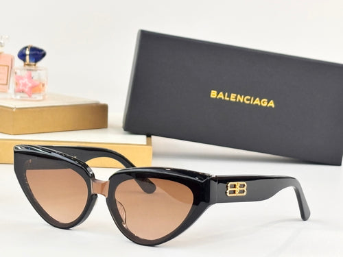 Black cat-eye sunglasses with gold B logo on temples