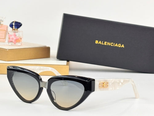 Black cat-eye sunglasses with tinted lenses and gold B temple logo