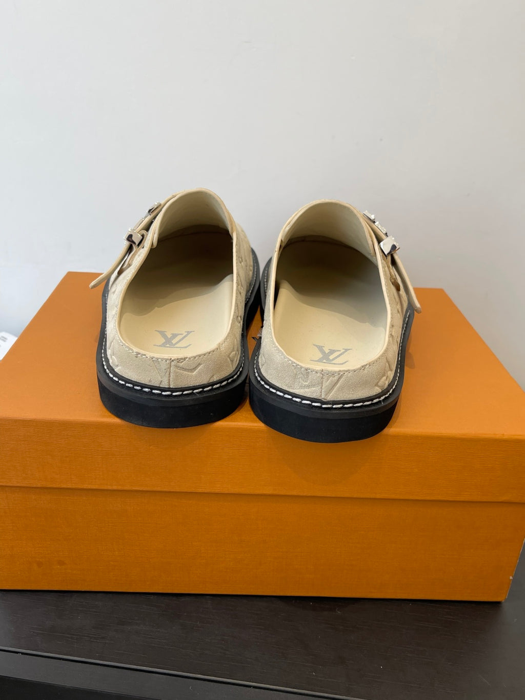 Louis Vuitton beige monogram sandals, back view showing heel and strap hardware