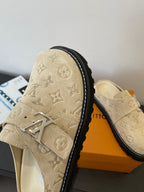 Louis Vuitton beige monogram sandals with wide front strap and black-trimmed sole