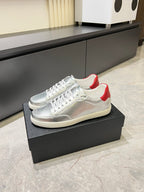 Unisex low-top sneakers, silver perforated upper with red collar lining and white sole
