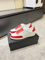 YSL unisex low-top sneakers, white upper with red toe cap and red lace-up