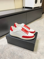 YSL unisex low-top sneakers, white upper with red side panels and red lace-up