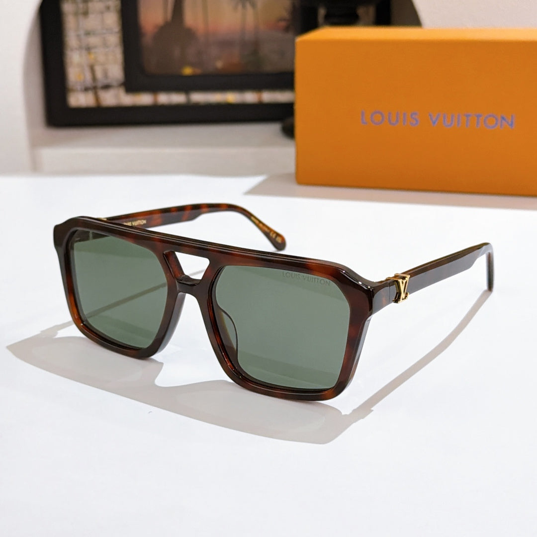 Tortoiseshell sunglasses with green tinted lenses and gold bridge detail.
